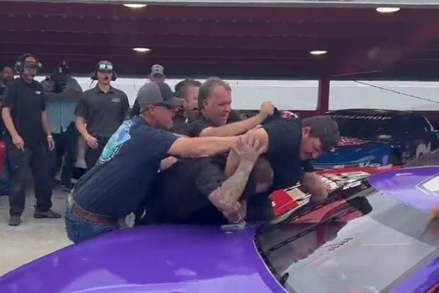 <p>Tempers flared as two NASCAR teams got into a brawl in the pit area of a Virginia speedway</p>