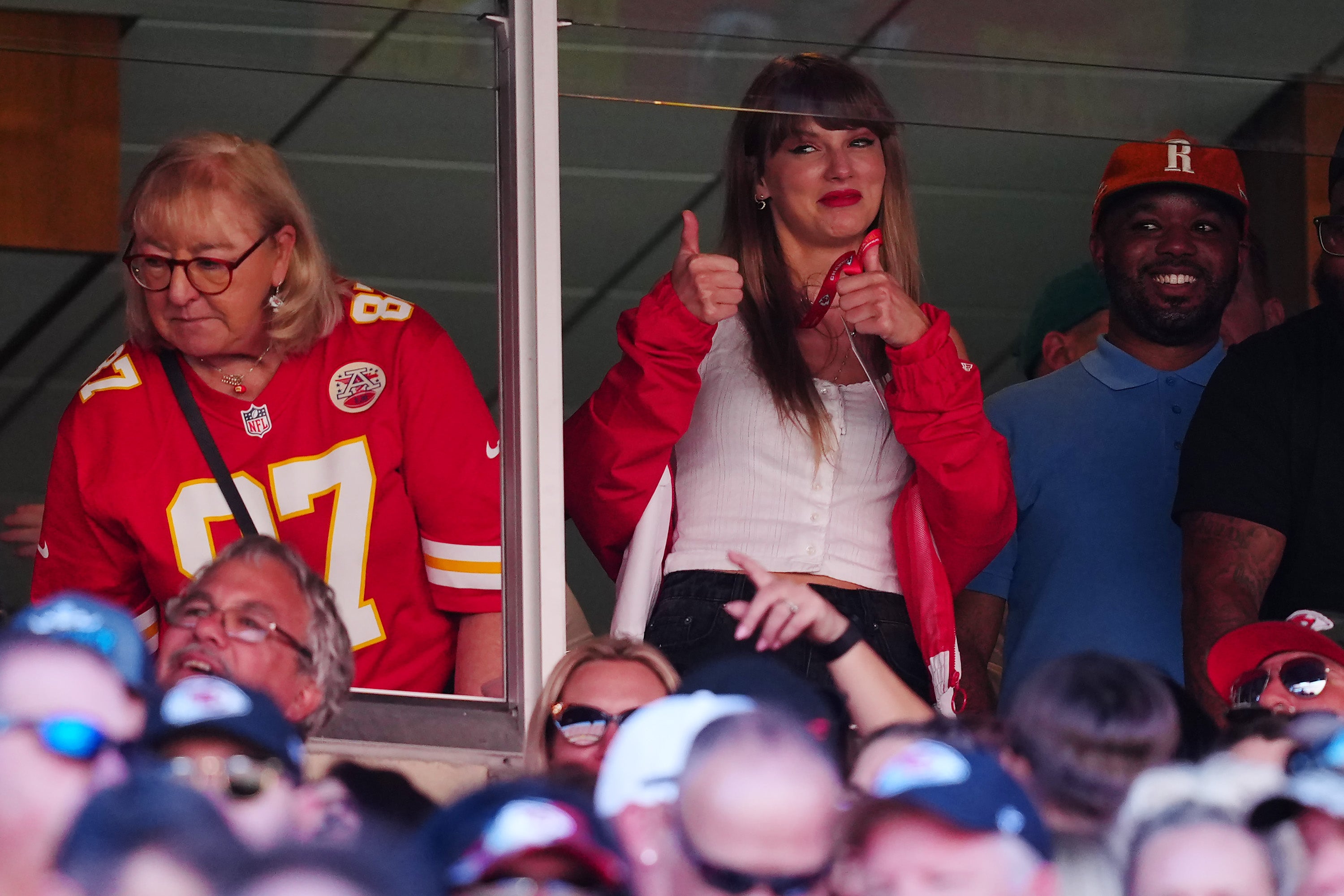 Taylor Swift gives the thumbs up during the first half the Kansas City Chiefs game with rumours she is in relationship with player Travis Kelce