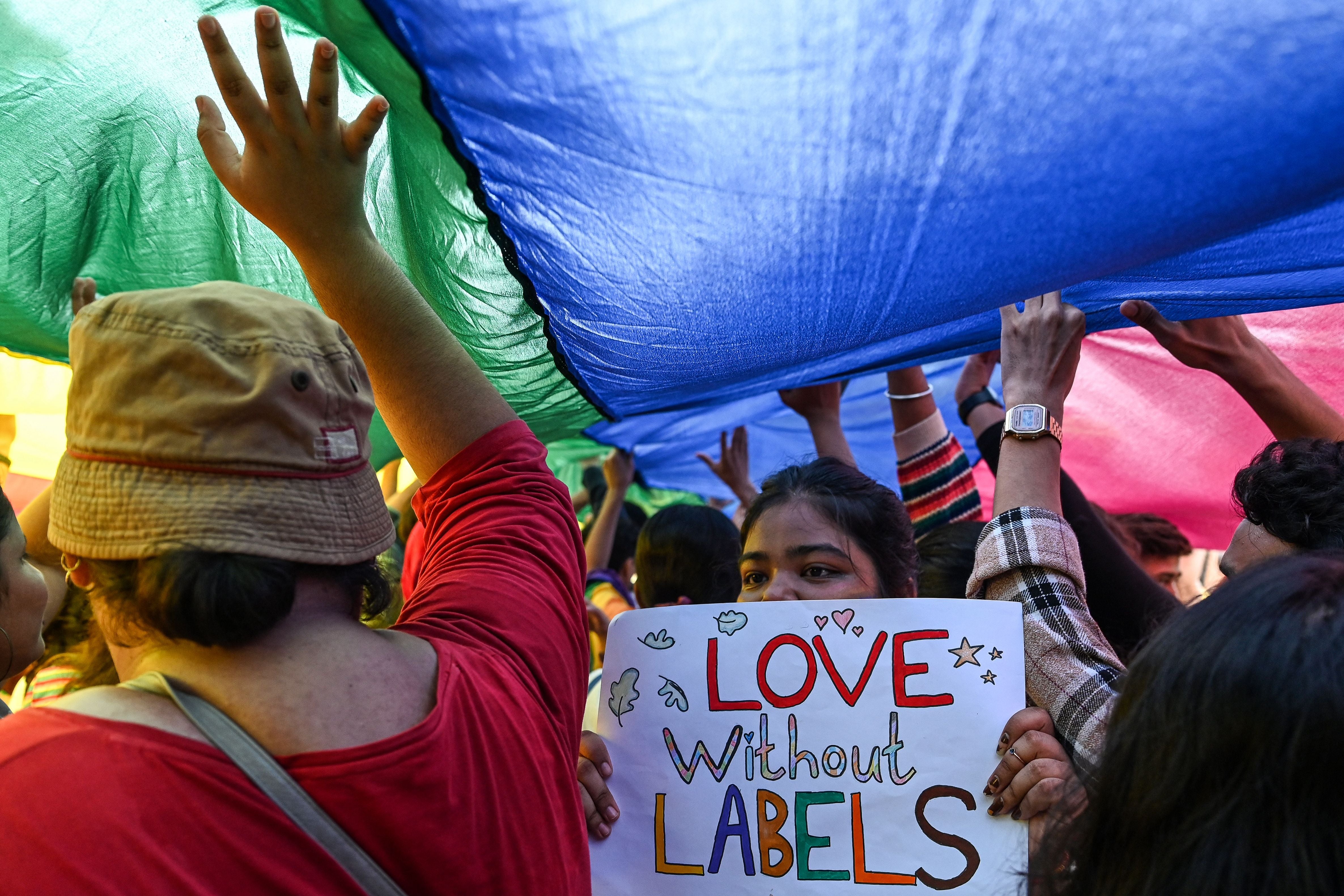 Gender rights activists and supporters of the LGBT+ community attend a pride parade in Mumbai on 24 June 2023