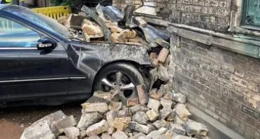 A stolen car crashed into their house with the perpetrators fleeing the scene