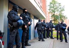 German police raid locations across the country in connection with smuggling of Syrian migrants