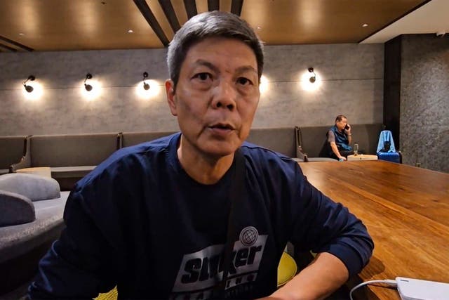 <p>In this image taken from video footage run by TVBS, Chinese dissident Chen Siming speaks during an interview at Taoyuan International Airport’s transit lounge in Taipei on Friday</p>