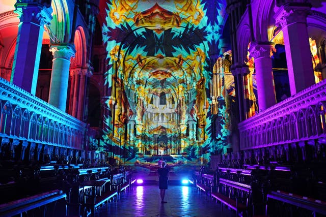 The Quire in Canterbury Cathedral, Kent, during a preview of the Luxmuralis: Renaissance, an art installation using moving light displays and original compositions to highlight the cathedral’s architecture and immerse visitors in paintings and artwork from the Renaissance period (Gareth Fuller/PA)