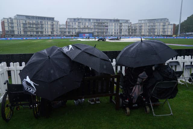 Fans get out the umbrellas at Bristol (Nick Potts/PA)