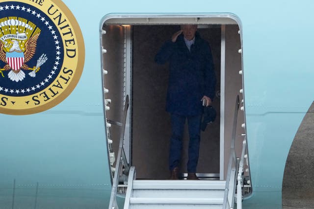 <p>President Joe Biden returns a salute as he boards Air Force One for a trip to Michigan to join striking United Auto Workers on the picket line, Tuesday, Sept. 26, 2023, in Andrews Air Force Base, Md.</p>