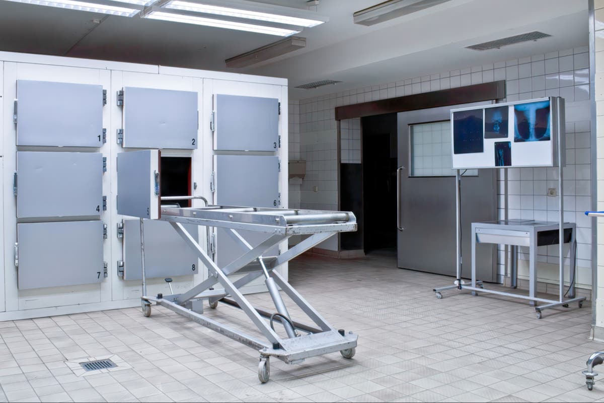 Mortuary workers accused of dropping father&rsquo;s body down stairs while removing it from family home