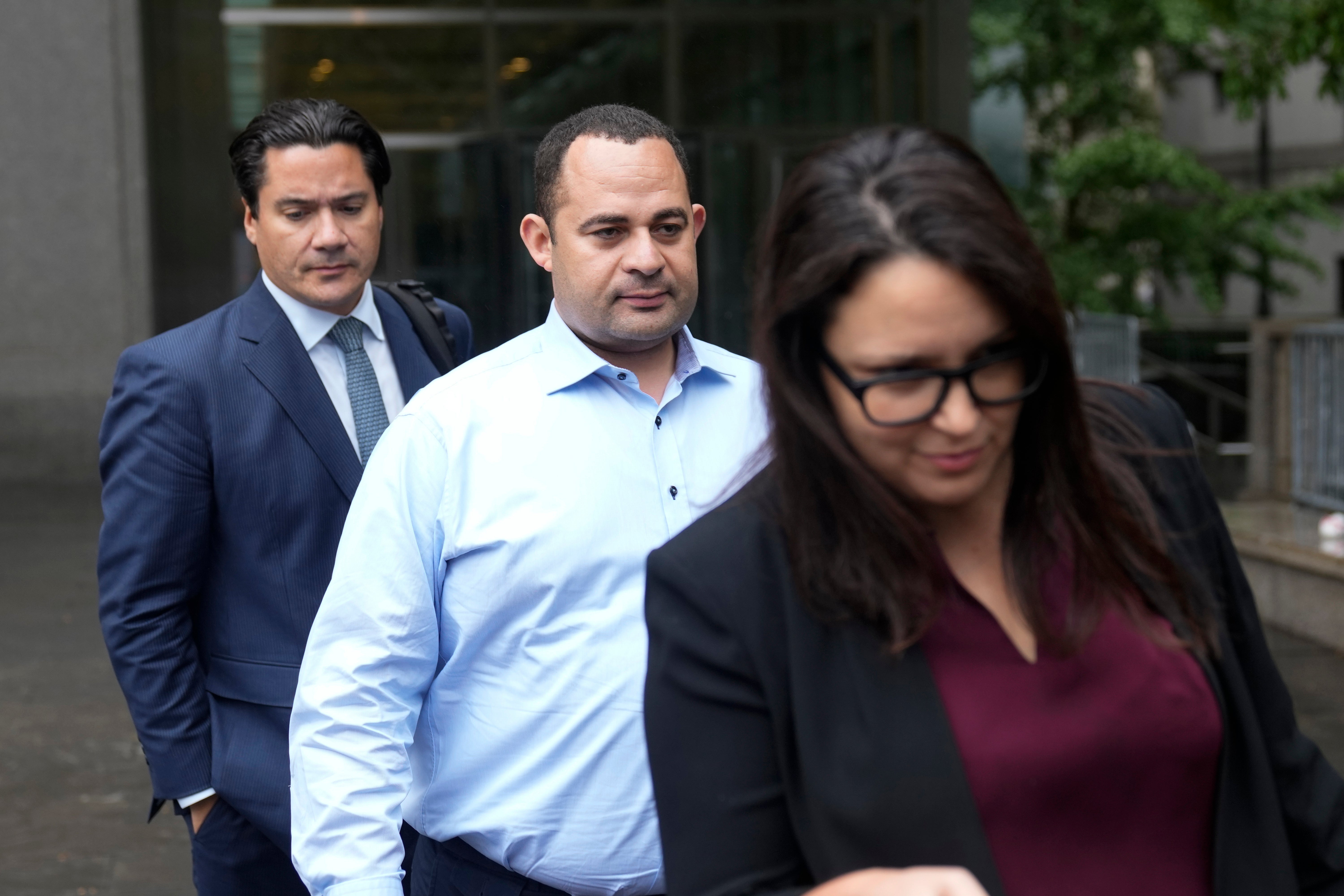 Wael Hana leaves federal courthouse in New York after arraignment