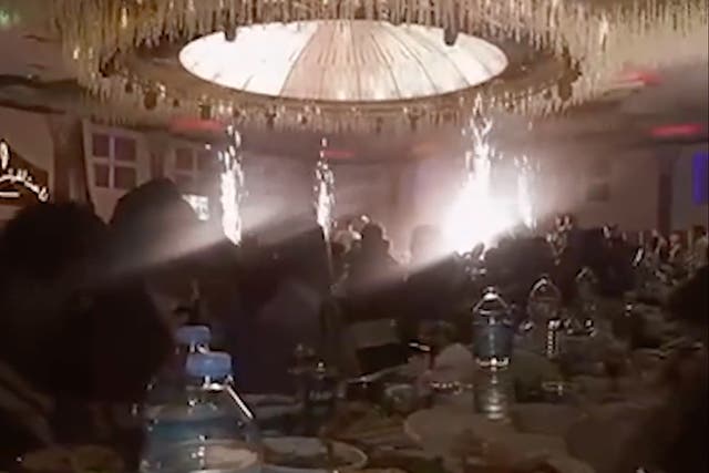 <p>Footage appeared to show the ceiling catch fire as fireworks were set off</p>