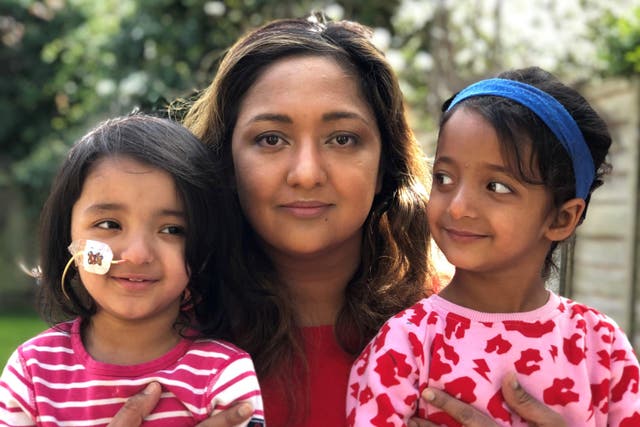 Pamela with twins Daya (left) and Jasmine (right) has backed the £300 million fundraiser for a new children’s cancer centre at Great Ormond Street Hospital (Family handout/PA)