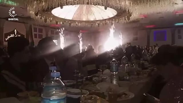 <p>Wedding guests enjoy meal moments before deadly fire breaks out in Iraq.</p>