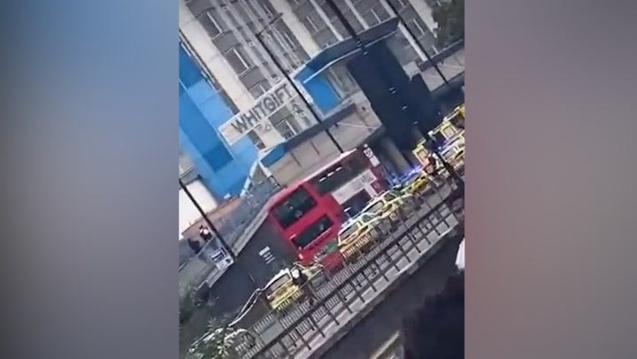 Croydon: Videos show police cars surrounding bus after 15-year-old girl fatally stabbed