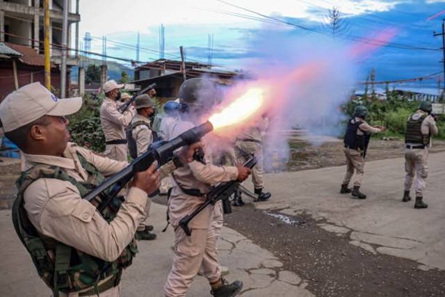 <p>A policeman fires tear gas to the protesters as they demand restoration of peace in India’s northeastern state of Manipur after ethnic violence, in Imphal on 21 September 2023</p>