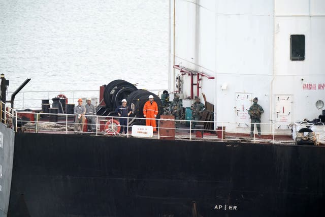 Military personnel on board the MV Matthew (Niall Carson/PA)