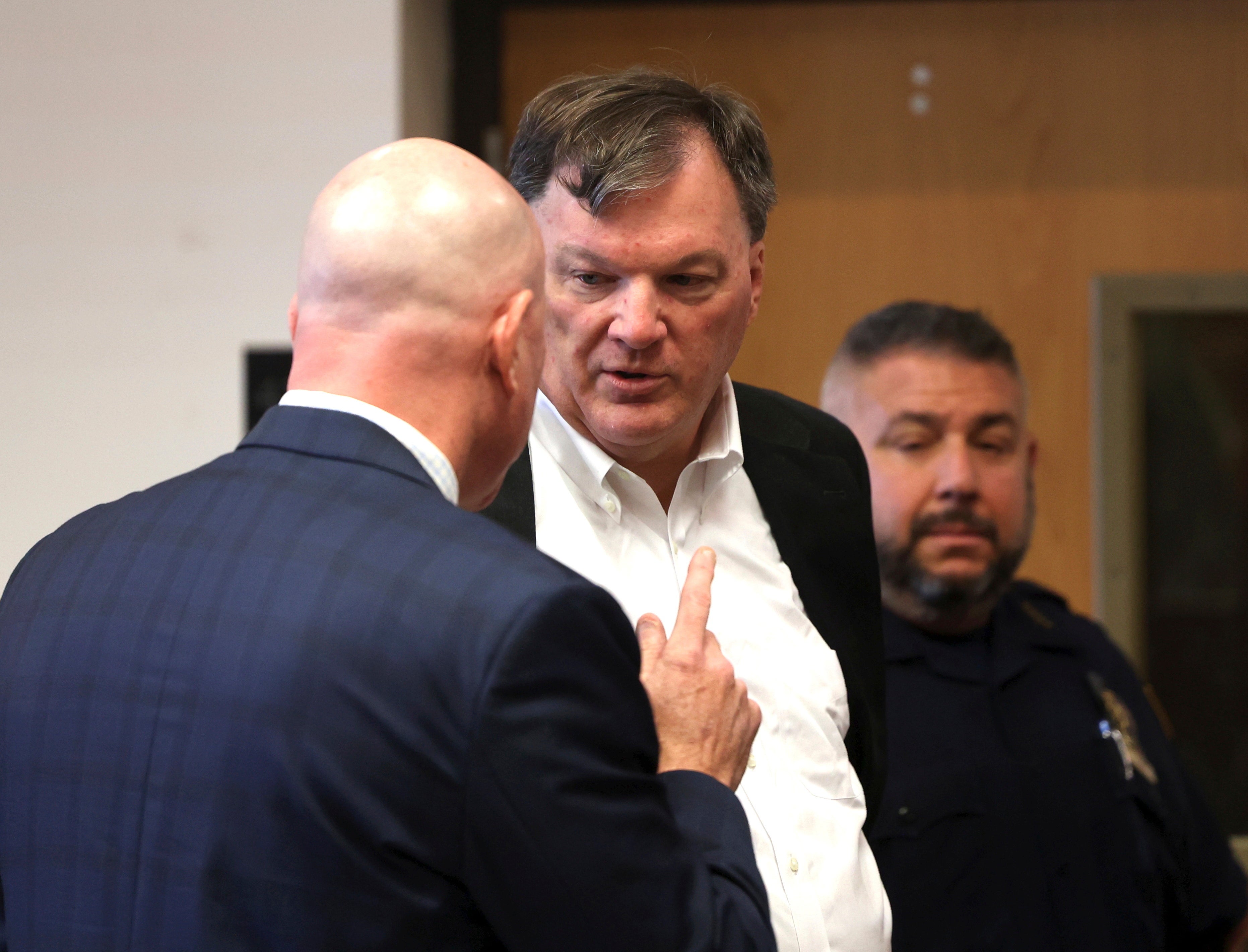 Rex Heuermann appears with his lawyer Michael J. Brown