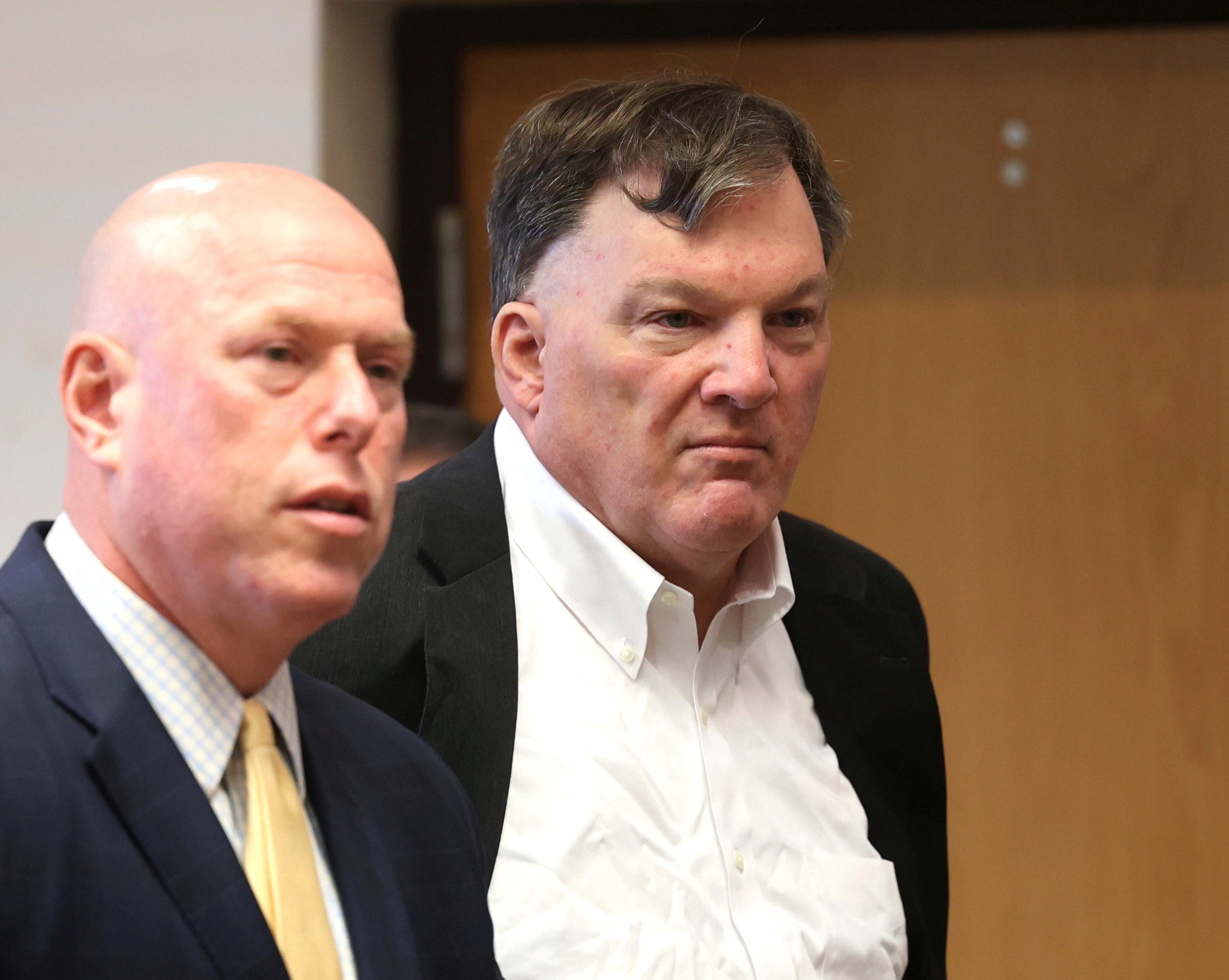 Rex Heuermann appears with his lawyer Michael J. Brown, left, at Suffolk County Court in Riverhead,