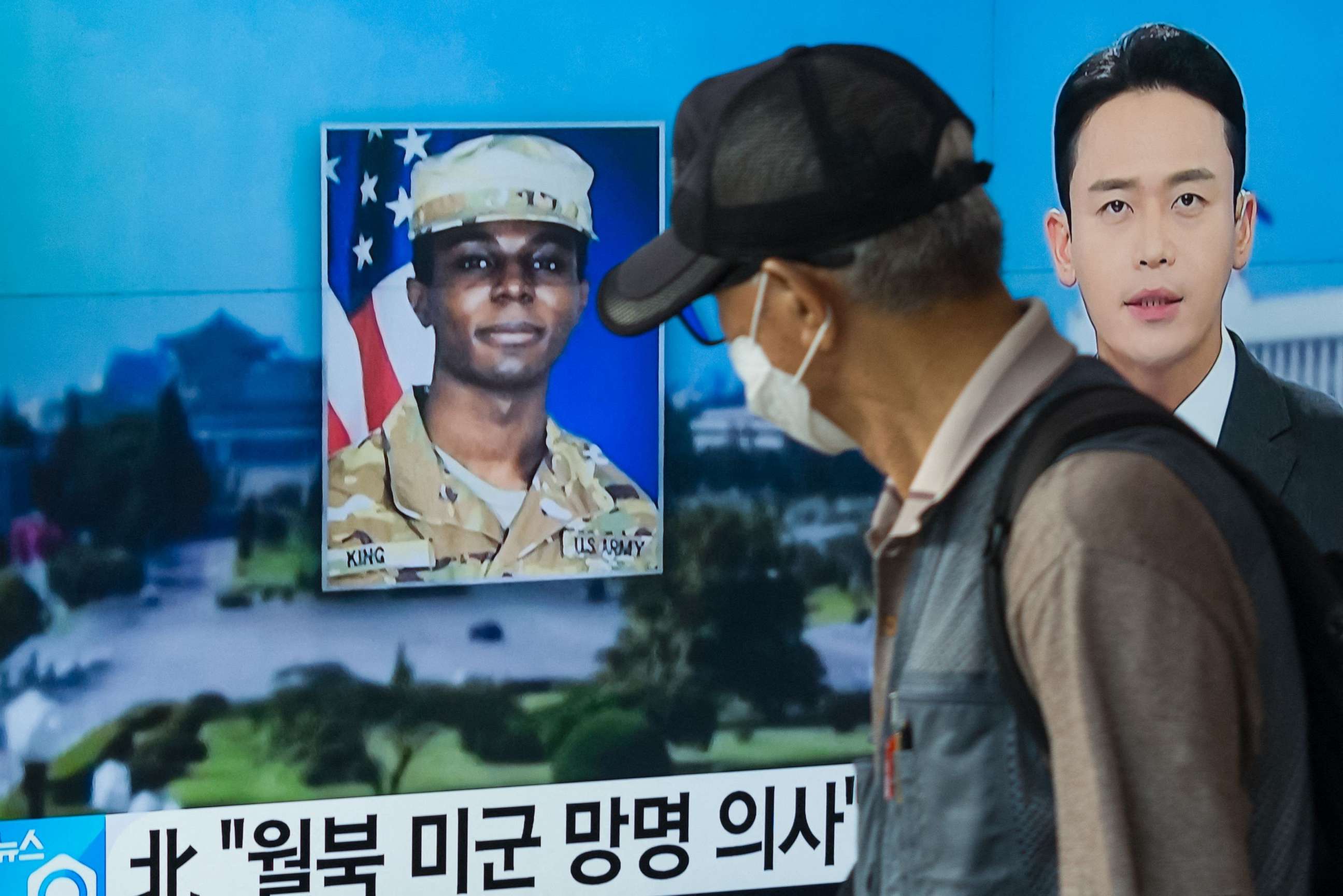 This photo taken in Seoul on August 16, 2023 showing a news broadcast featuring a photo of US soldier Travis King