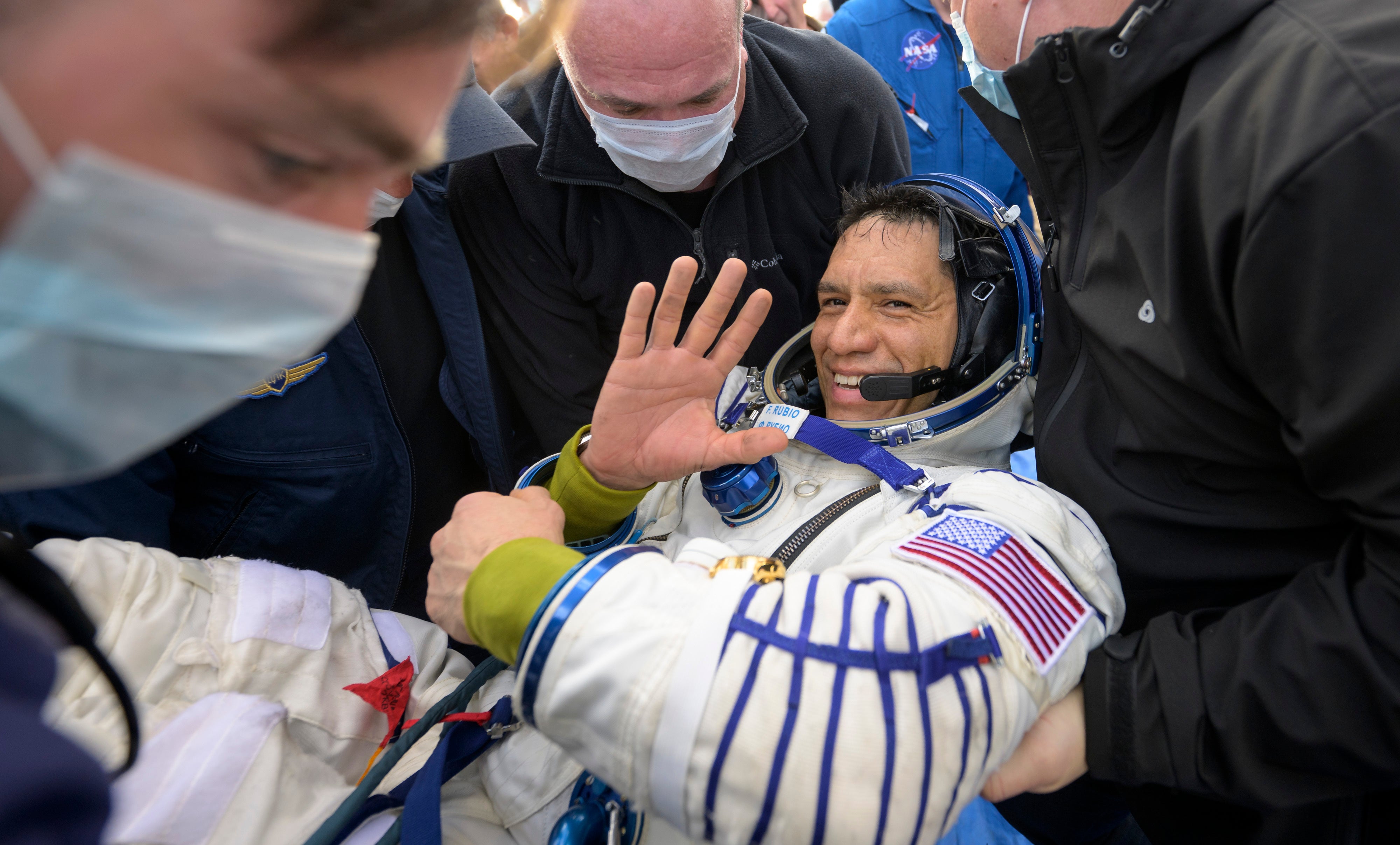 Frank Rubio is helped out of the Soyuz MS-23 spacecraft minutes after he and Russian cosmonauts Sergey Prokopyev and Dmitri Petelin landed in a remote area near the town of Zhezkazgan, Kazakhstan