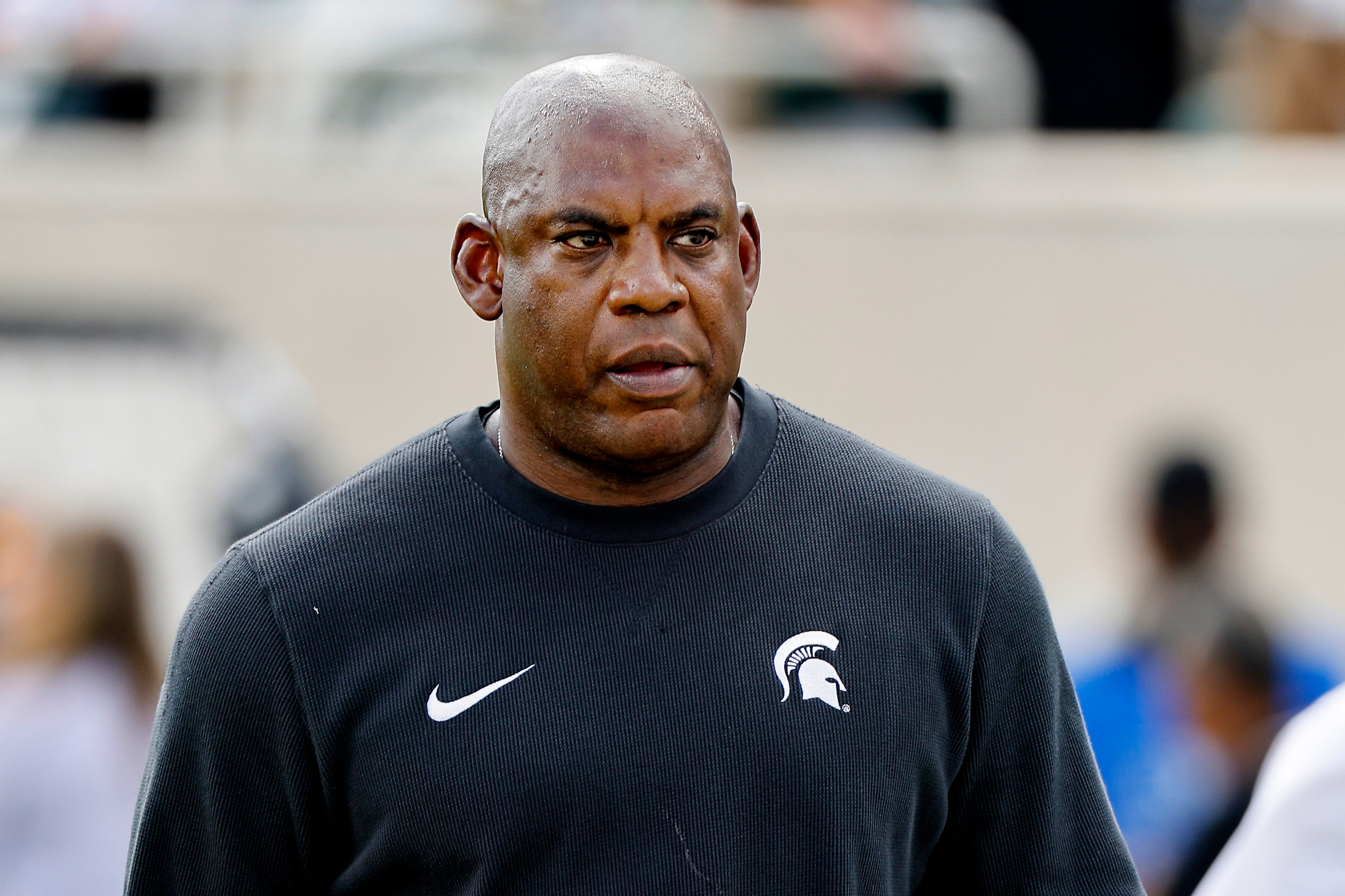 Mel Tucker head coach of the Michigan State Spartans looks on before a game against the Richmond Spiders at Spartan Stadium on September 09, 2023 in East Lansing, Michigan.