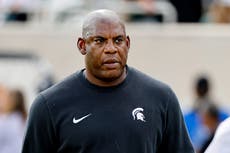 Michigan State University football coach fired after rape survivor accused him of sexual harassment
