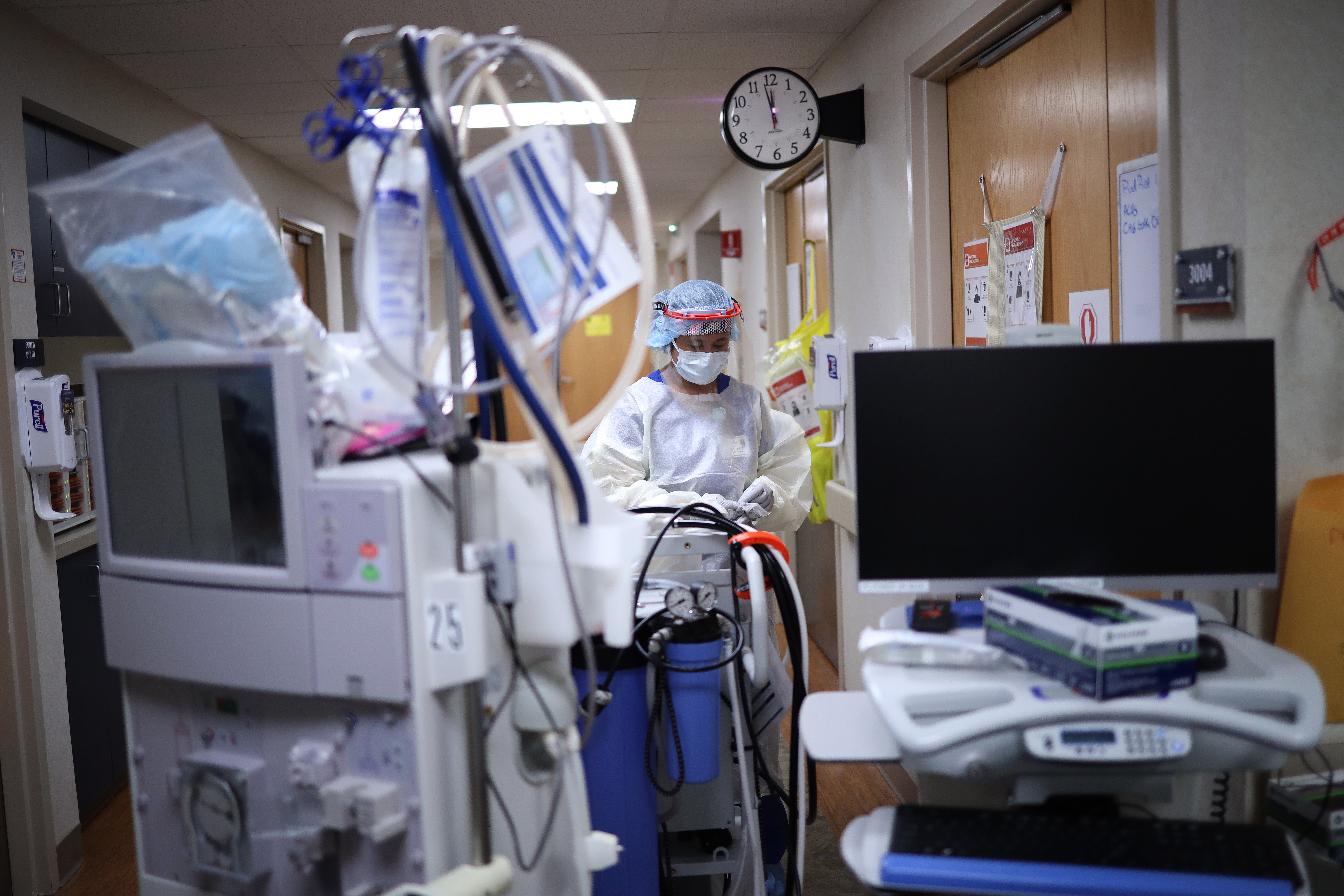 A member of the dialysis prepares to treat a patient with coronavirus in the intensive care unit at a hospital on May 1, 2020 in Leonardtown, Maryland.