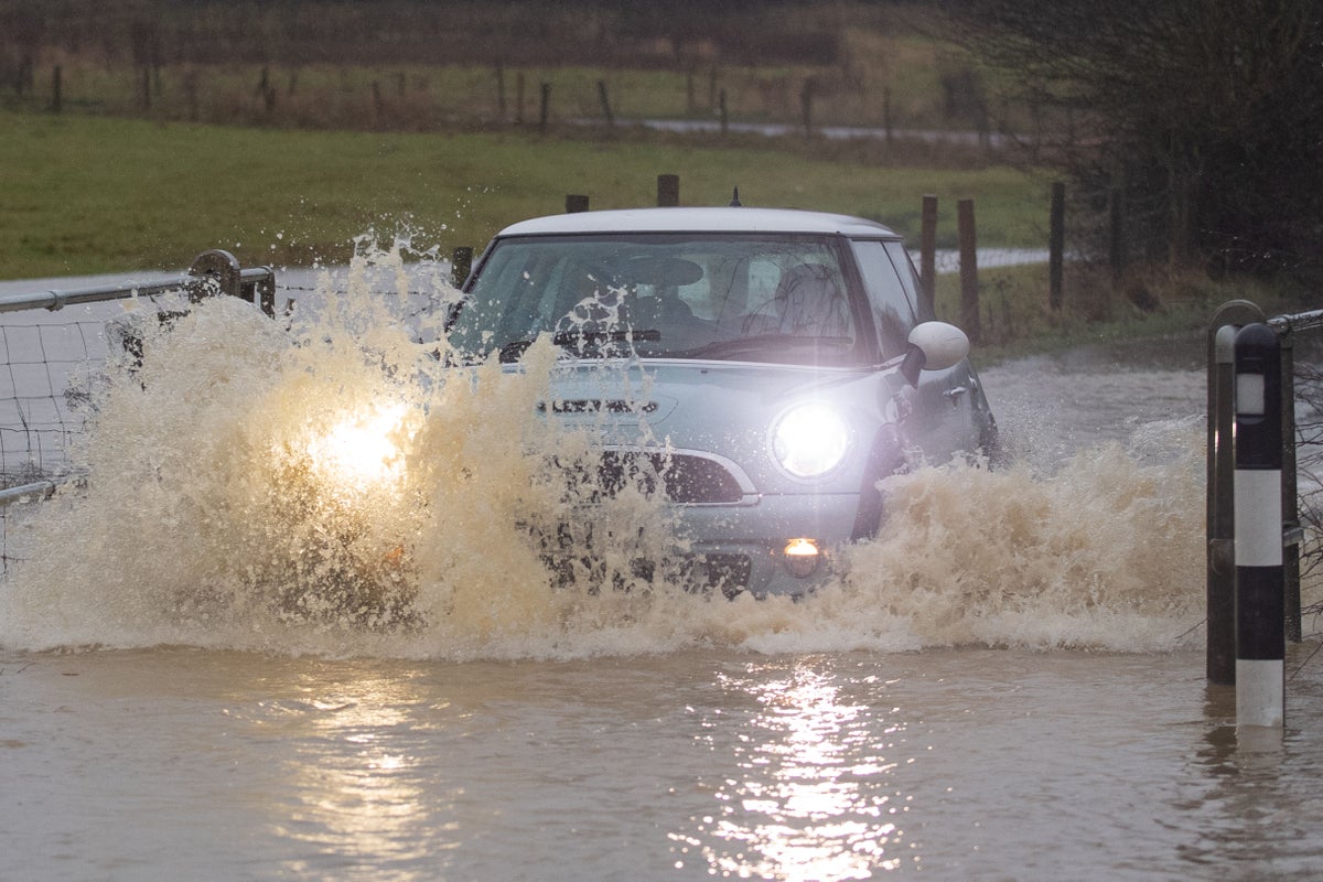 Councils deluged with compensation claims for flash floods as road funding cut