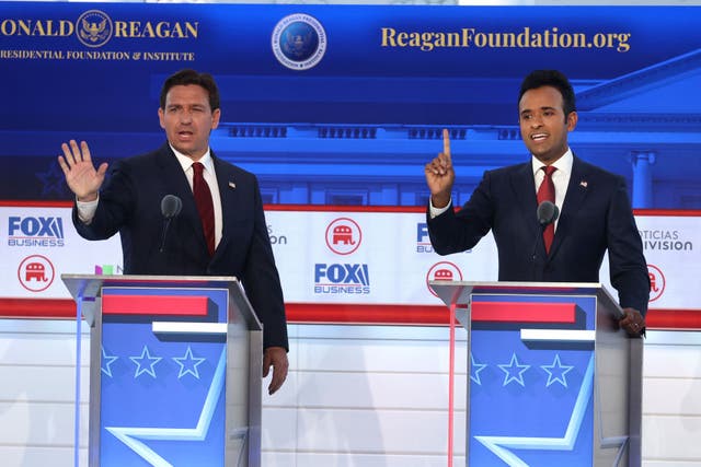 <p>Republican presidential candidates (L-R) Florida Gov. Ron DeSantis and Vivek Ramaswamy participate in the FOX Business Republican Primary Debate at the Ronald Reagan Presidential Library on September 27, 2023 in Simi Valley, California</p>