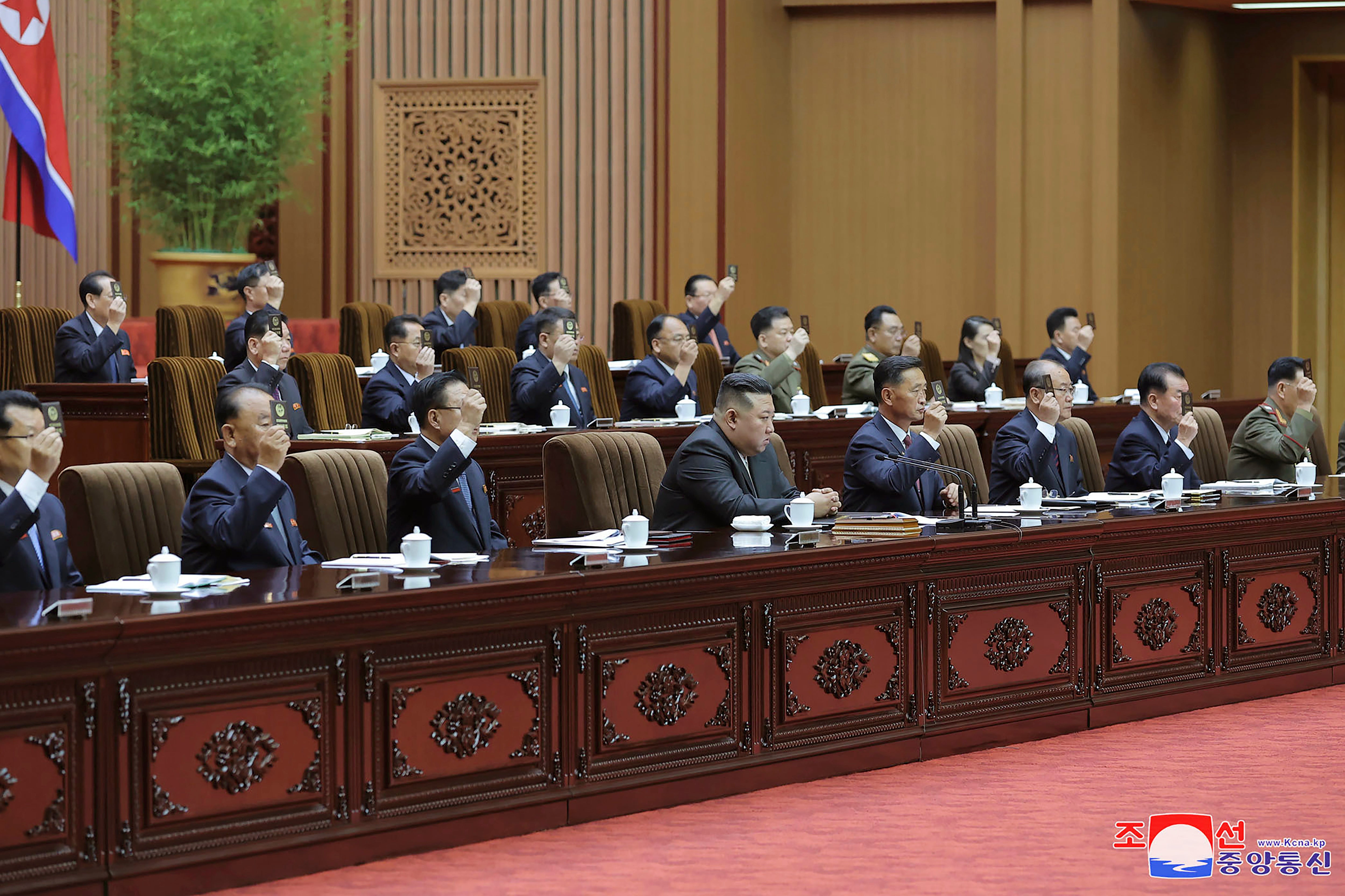 In this photo taken during a two-day session on 26-27 September 2023 and provided by the North Korean government, North Korean leader Kim Jong-un (bottom centre) attends a meeting of the country’s parliament