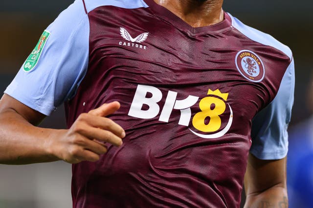 <p>An Aston Villa men’s player playing in a soaked home kit against Everton  </p>