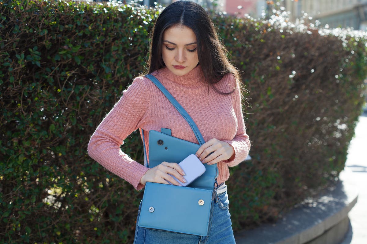 Half of women wish they didn’t have to carry handbags but feel they have no choice