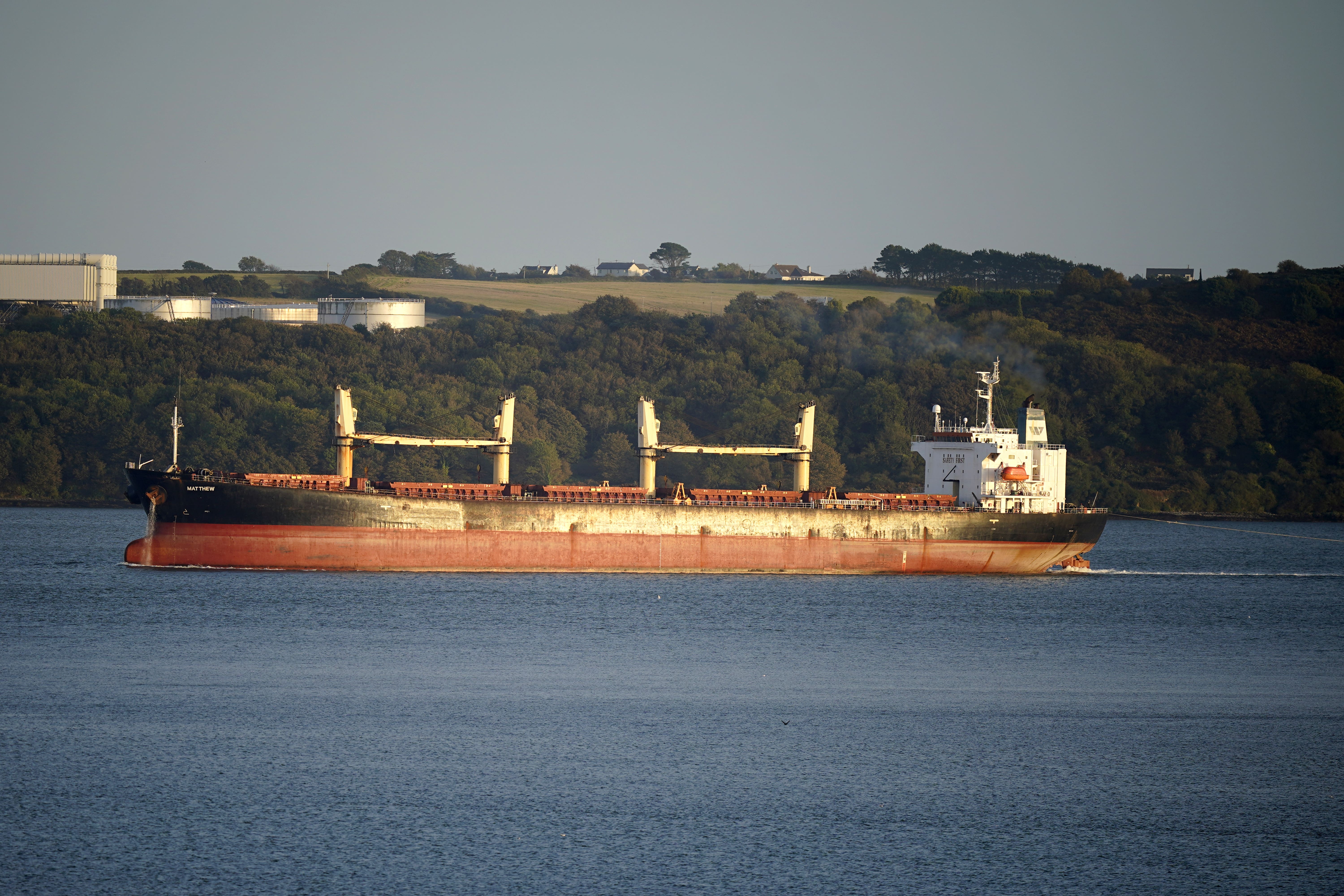 A cargo vessel named MV Matthew is escorted into Cobh in Cork by the Irish Navy (Niall Carson/PA)