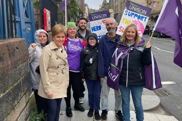 Nicola Sturgeon stood with striking school staff in Edinburgh (Unison Scotland/PA)