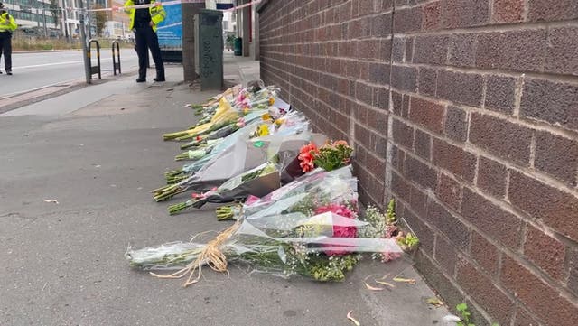<p>Flowers left at scene where 15-year-old Eliyanna Andam was fatally stabbed on her way to school.</p>