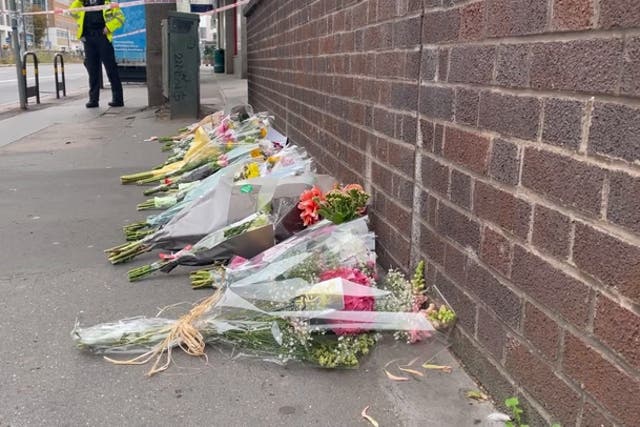 <p>Flowers left at scene where 15-year-old Eliyanna Andam was fatally stabbed on her way to school.</p>