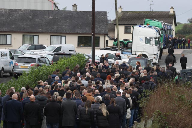 The funeral procession Ronan Wilson leaves his family home on it’s way to St Mary’s Church, Dunamore, for his funeral (Liam McBurney/PA)