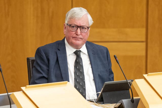 Fergus Ewing watched First Minster’s Questions on Thursday from the backbenches (Jane Barlow/PA)