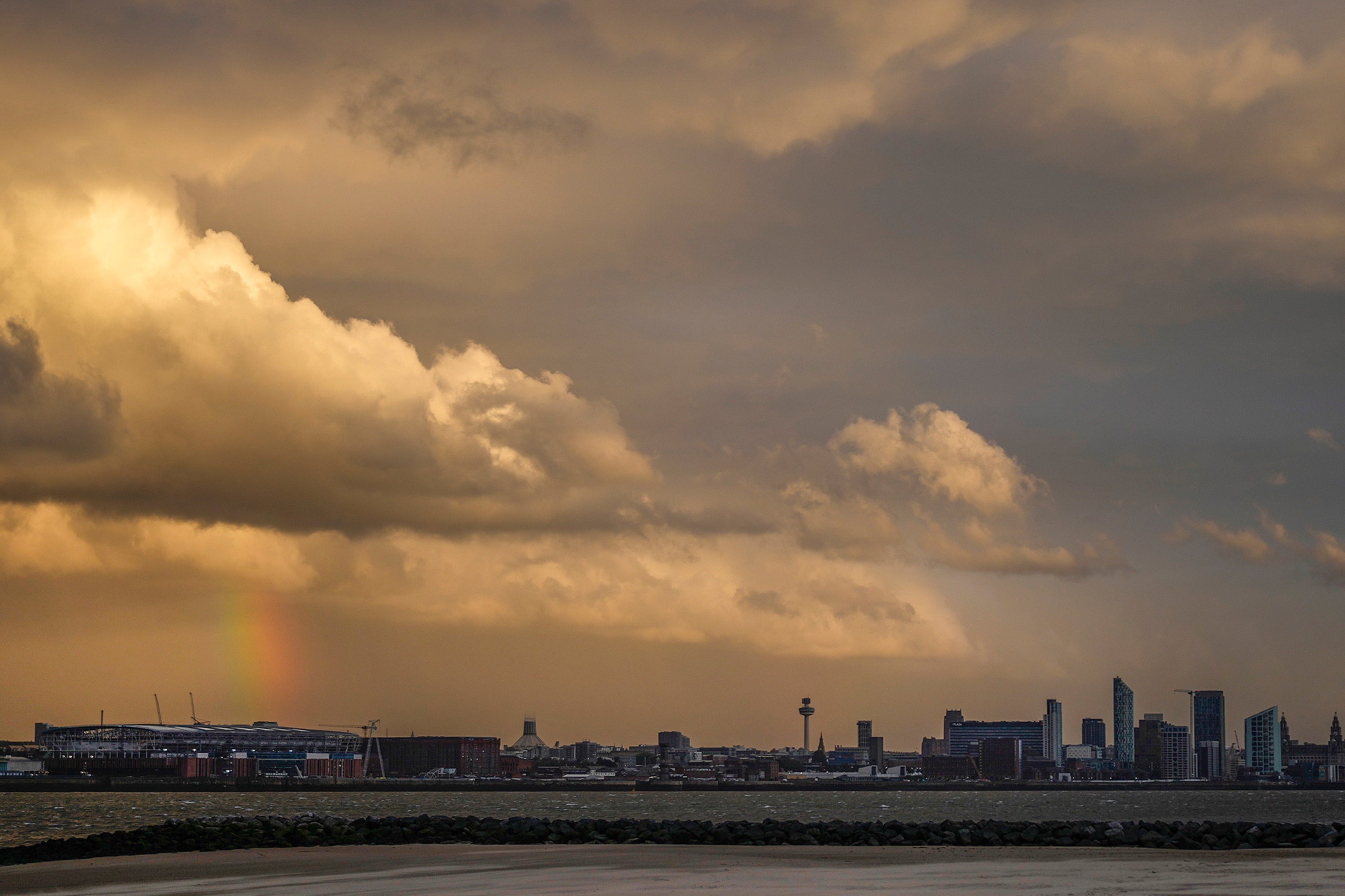 Storm clouds gather over Liverpool and the river Mersey