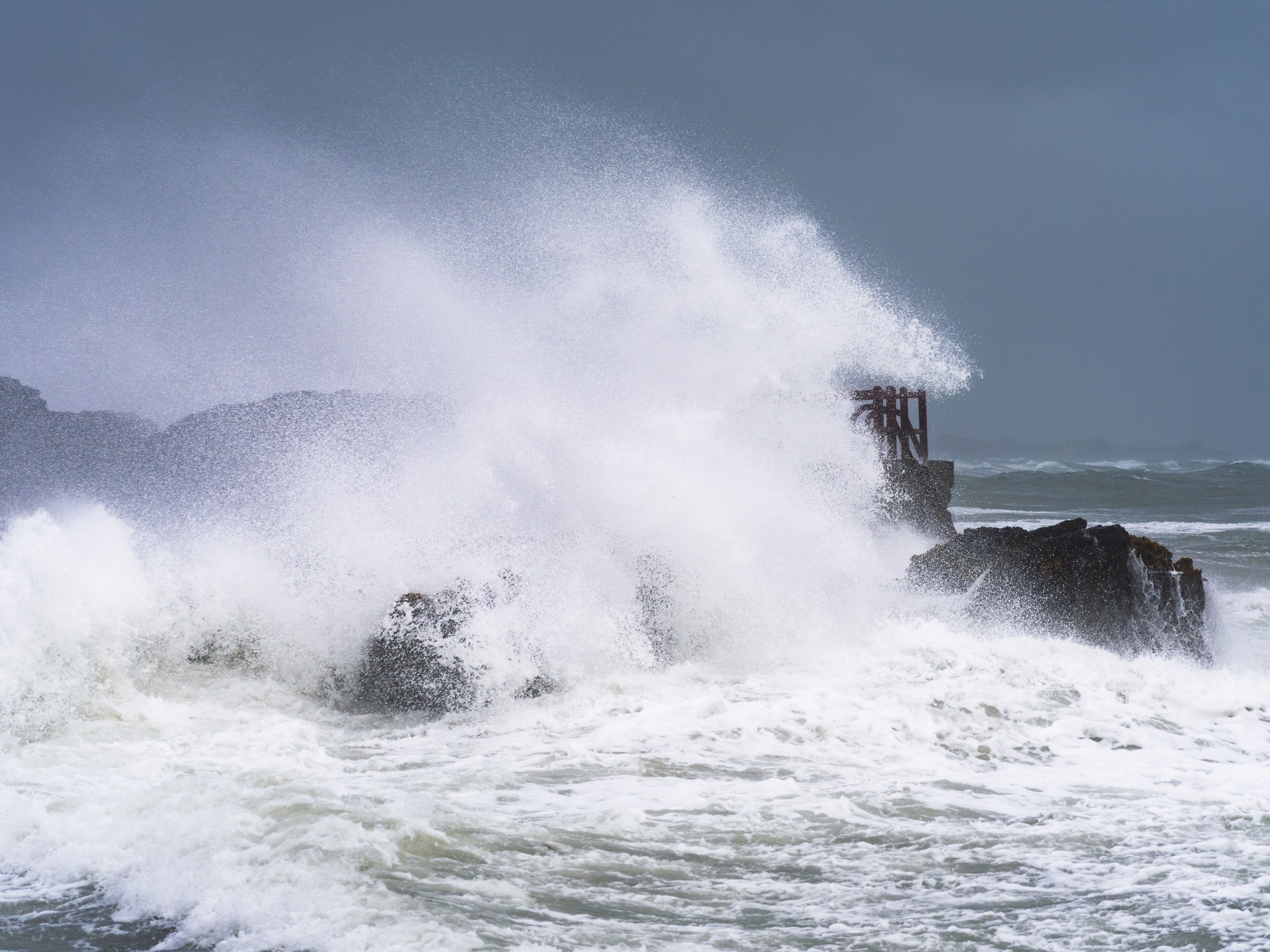 Waves hitting the rocks in Dublin, Ireland