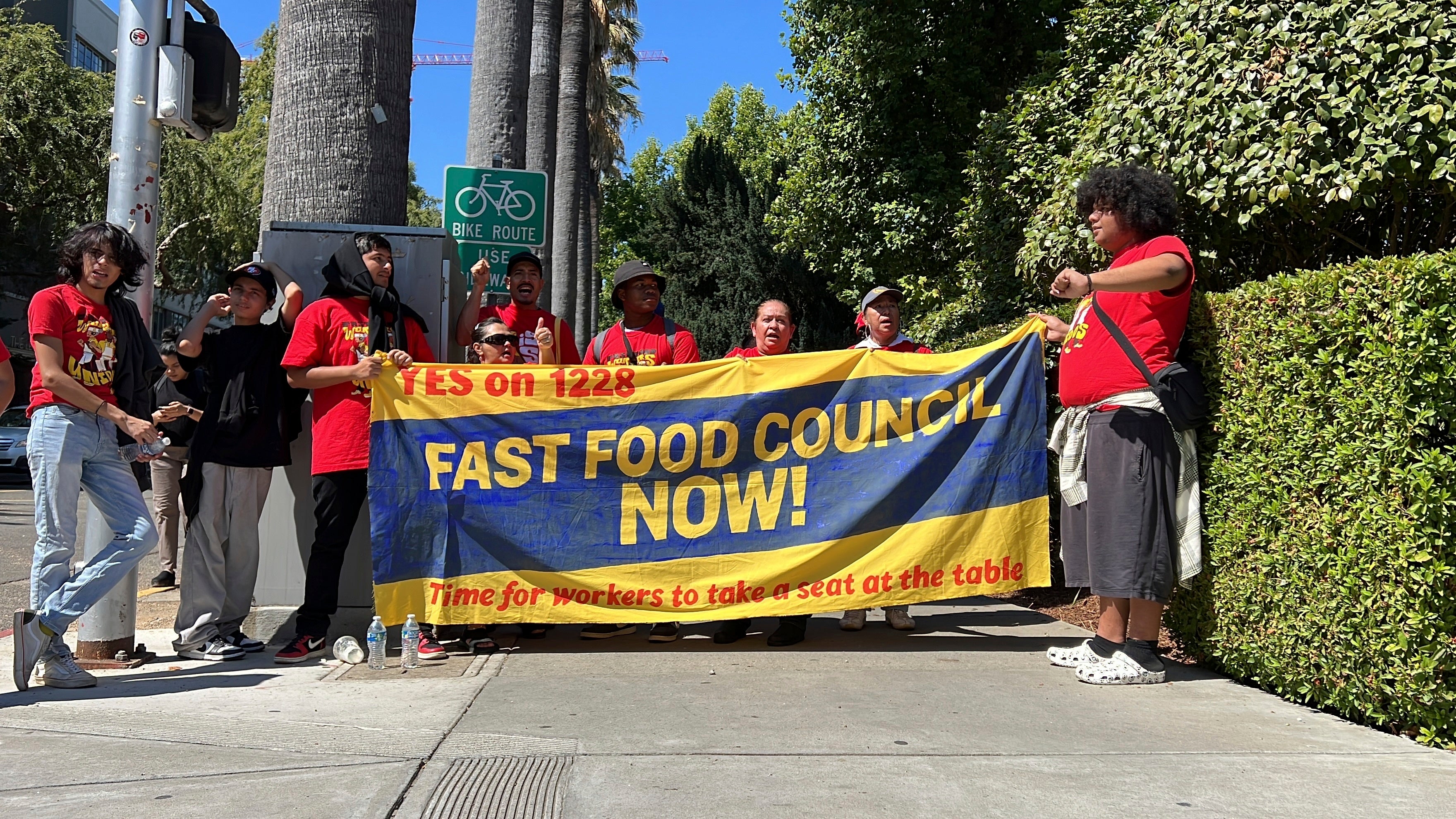 California Gov. Gavin Newsom signs law to raise minimum wage for fast