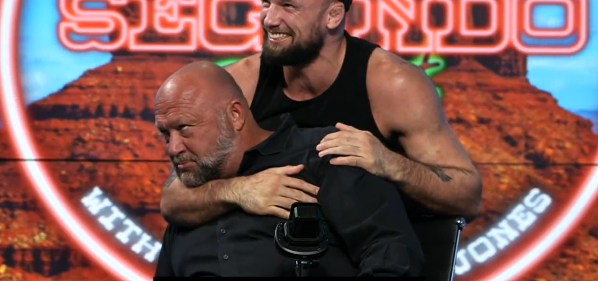 Far-right conspiracy theorist Alex Jones choked unconscious by martial arts star live on podcast