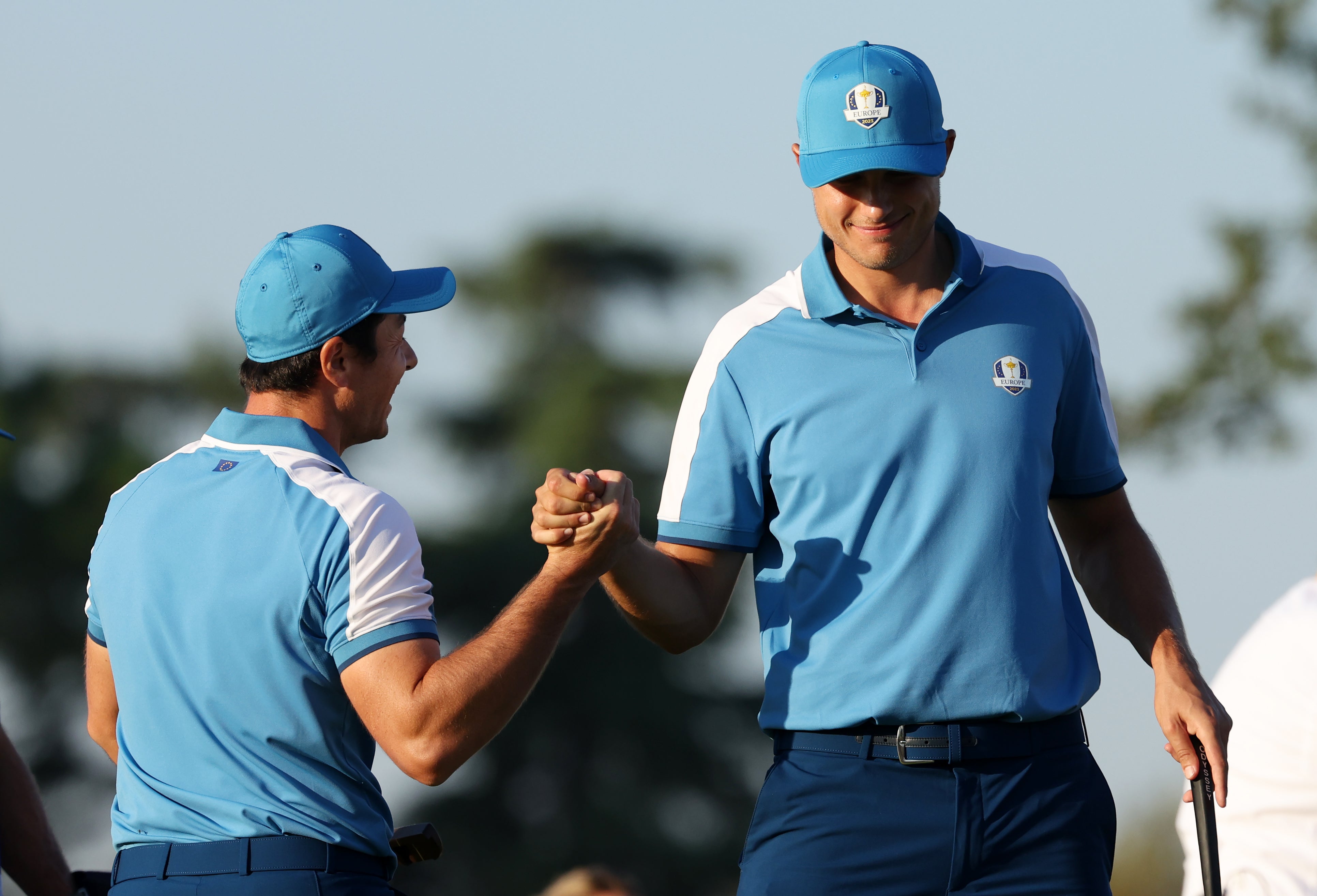 Hovland and Aberg celebrate together during their foursomes win