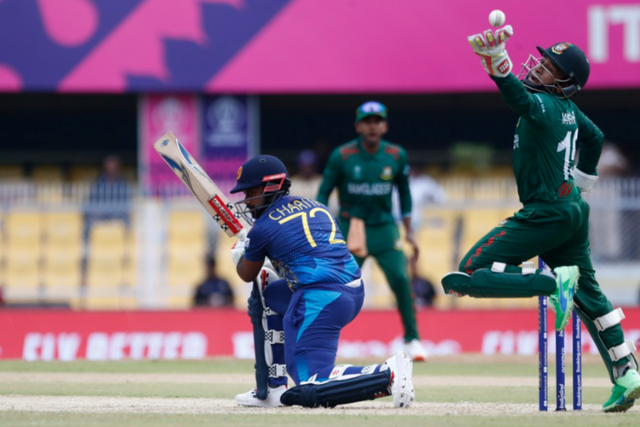 <p>Mushfiqur Rahim of Bangladesh tries to takes a catch to dismiss Charith Asalanka of Sri Lanka during the Bangladesh and Sri Lanka warm-up match </p>