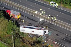 M53 bus crash latest - Schoolgirl and bus driver killed as packed school coach flips on motorway
