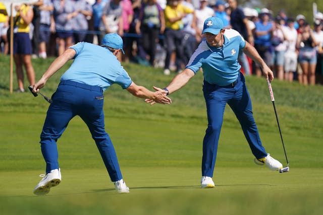 Europe’s Matt Fitzpatrick and Rory McIlroy celebrate on the 2nd during the Fourballs on day one of the 44th Ryder Cup in Rome (Zac Goodwin/PA)