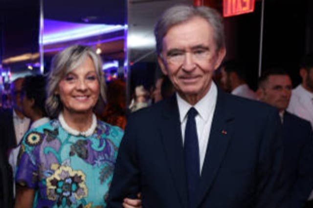 <p>Bernard Arnault, pictured with wife Helene, is being investigated by Tracfin  in France </p>