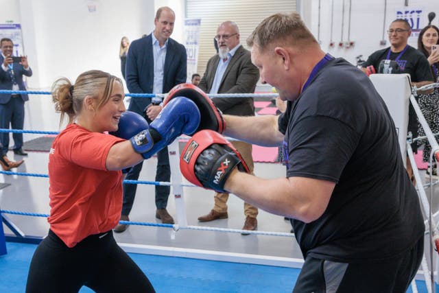 The Prince of Wales watches Jess Bryden sparring with Paul Rogers during his visit to Swindon-based youth charity Best – Be A Better You (Jonathan Buckmaster/Daily Express/PA)
