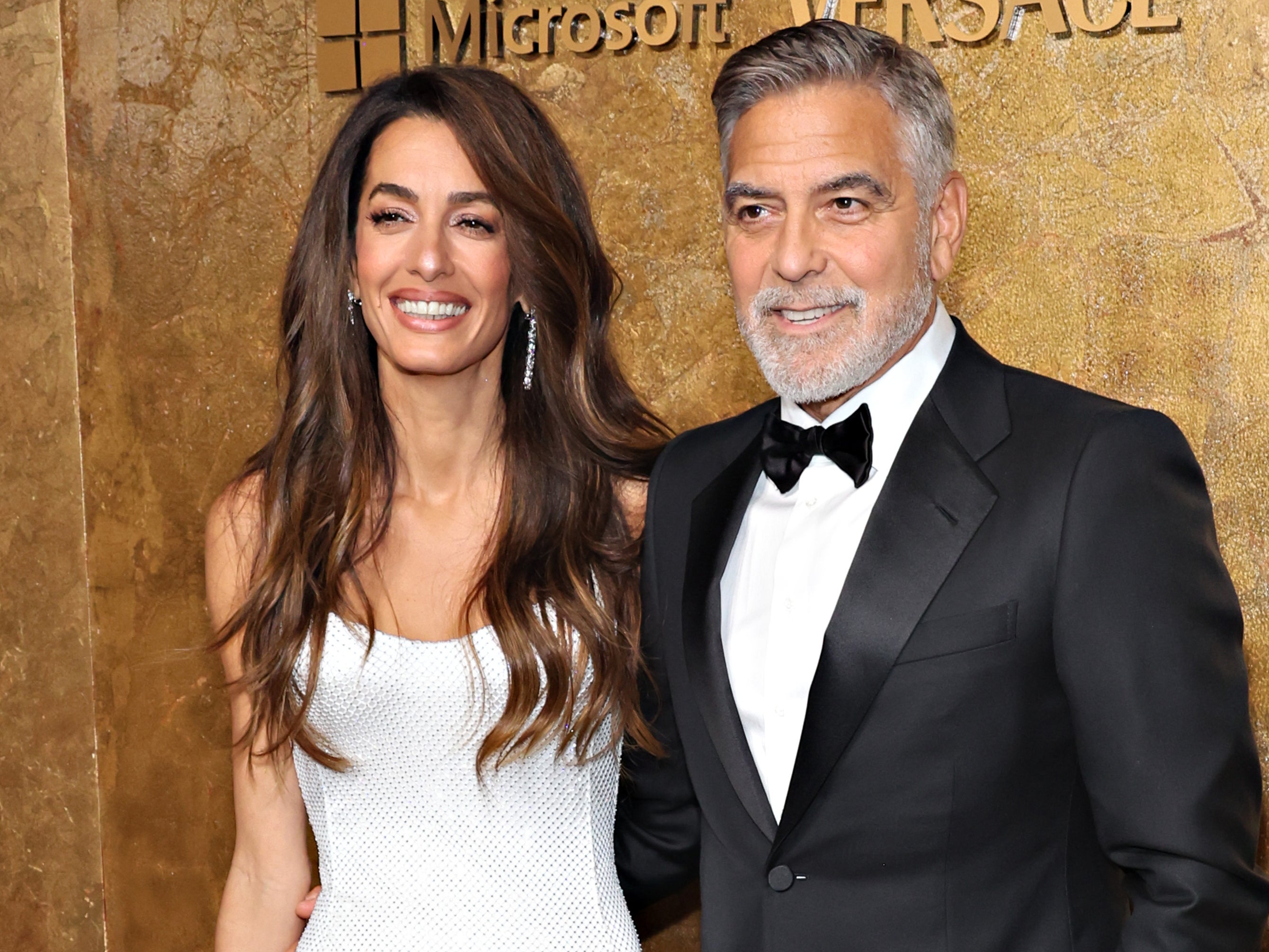 George Clooney, who has been open about his health woes, with his wife Amal