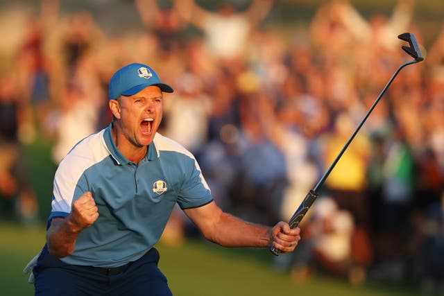 <p>Justin Rose celebrates after making the final putt of the day</p>
