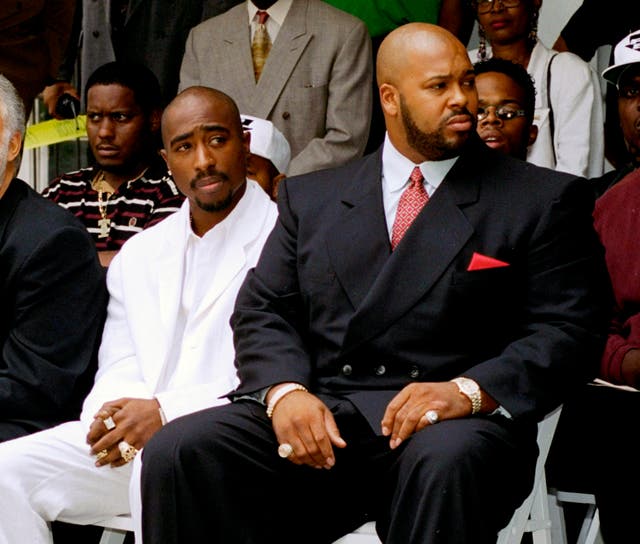 <p>FILE - Rapper Tupac Shakur, left, and Death Row Records Chairman Marion Suge Knight, attend a voter registration event in South Central Los Angeles, on Aug. 15, 1996. </p>