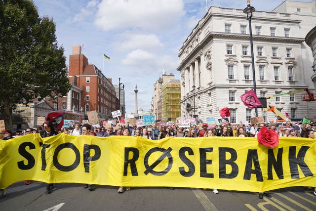 <p>People take part in a protest in central London last year after the controversial Equinor Rosebank North Sea oil field was given the go-ahead (Lucy North/PA)</p>