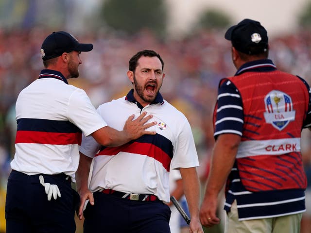 <p>Patrick Cantlay celebrates his put on the 18th </p>